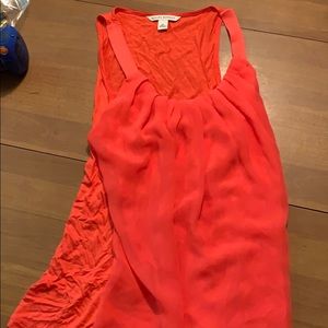 Bright reddish coral colored tank